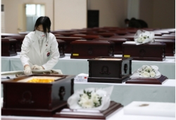 第八批在韩中国人民志愿军烈士遗骸装殓仪式在韩国举行