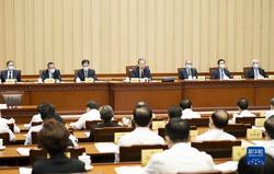十四届全国人大常委会第三次会议在京闭幕