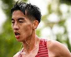 2小时07分09秒 杨绍辉打破中国马拉松纪录