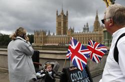 英国议会通过“卢旺达计划” 能否执行存争议