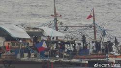 菲多艘船只在黄岩岛邻近海域非法聚集，中国海警加强现场监视取证
